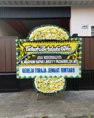 Papan Bunga Duka di Segala Anyar